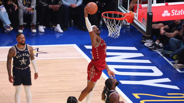 Feb 18, 2024; Indianapolis, Indiana, USA; Western Conference guard Shai Gilgeous-Alexander (2) of the Oklahoma City Thunder dunks the ball against the Eastern Conference All-Stars during the third quarter in the 73rd NBA All Star game at Gainbridge Fieldhouse.